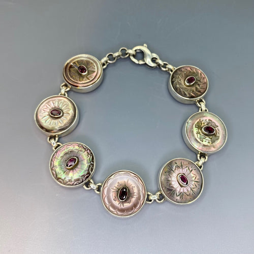 Victorian Carved Shell Buttons Bracelet with Garnet Facet Stone Center set in Sterling Silver