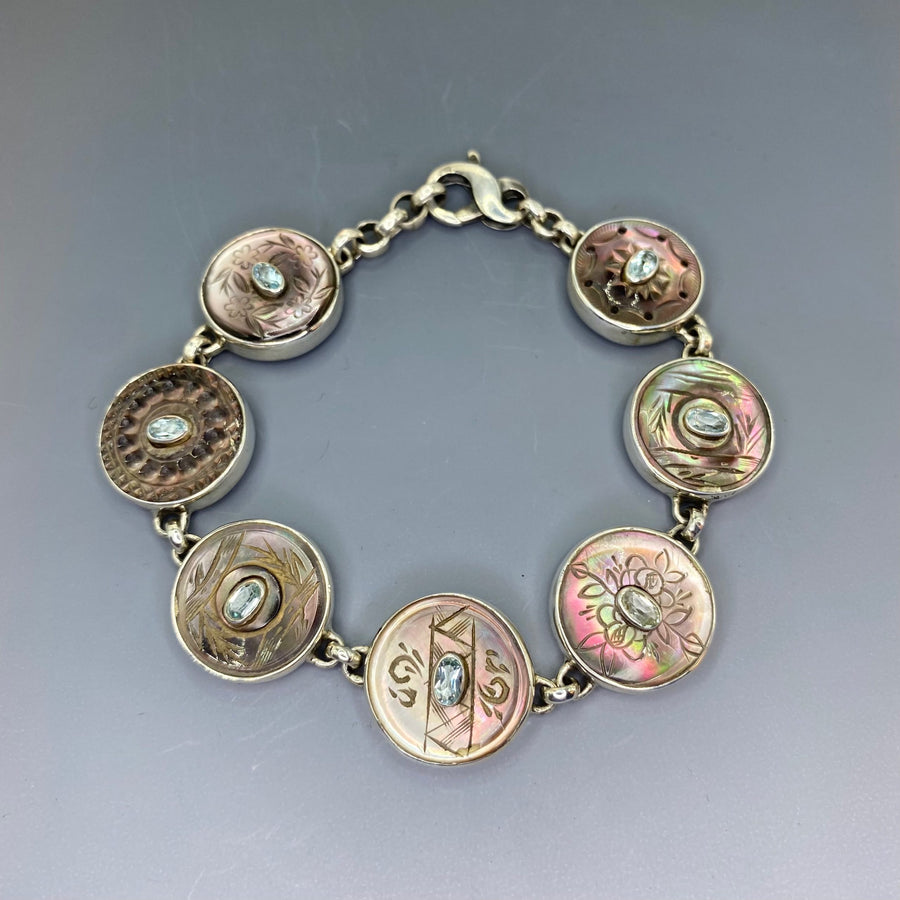 Victorian Carved Shell Buttons Bracelet with Aquamarine Facet Stone Center set in Sterling Silver