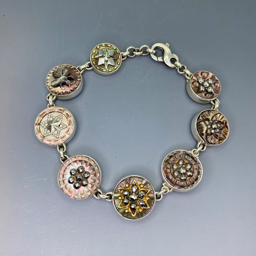 Victorian Carved Shell Buttons Bracelet with Steel Facet Center set in Sterling Silver