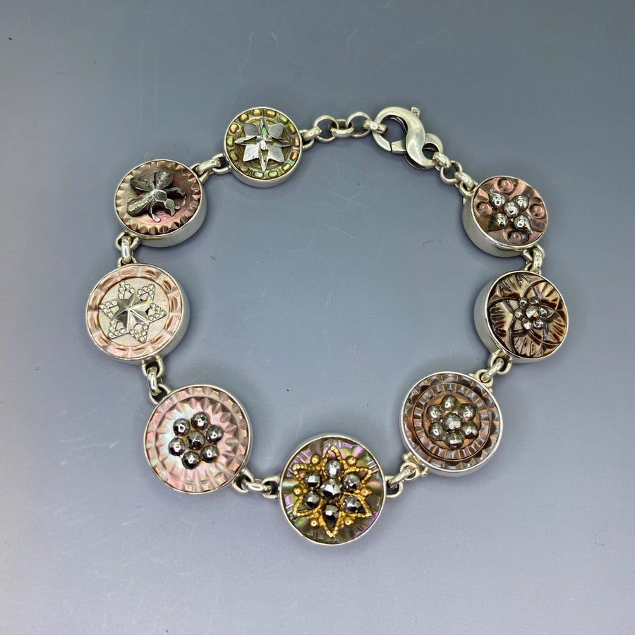 Victorian Carved Shell Buttons Bracelet with Steel Facet Center set in Sterling Silver