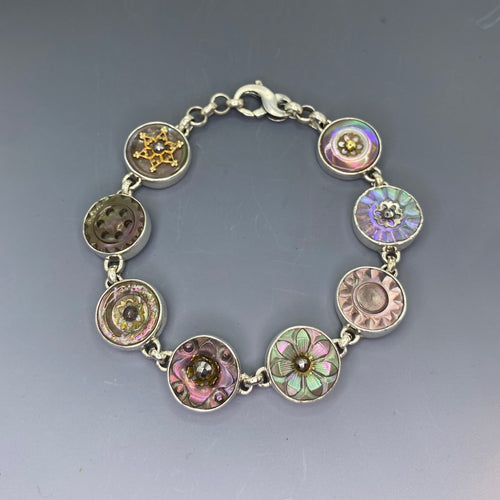 Victorian Carved Shell Buttons Bracelet with Steel Facet Center set in Sterling Silver