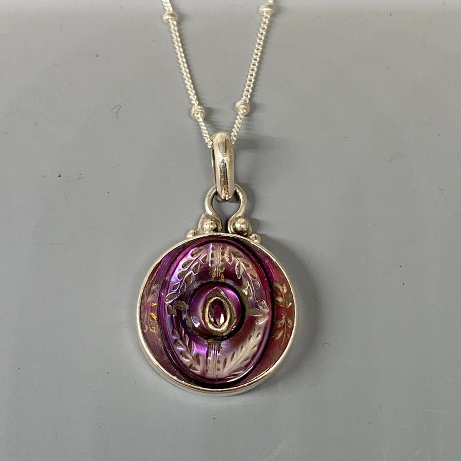 Victorian Carved Tinted Shell Button w/ Garnet Center set in Sterling Silver W/ Sterling silver chain