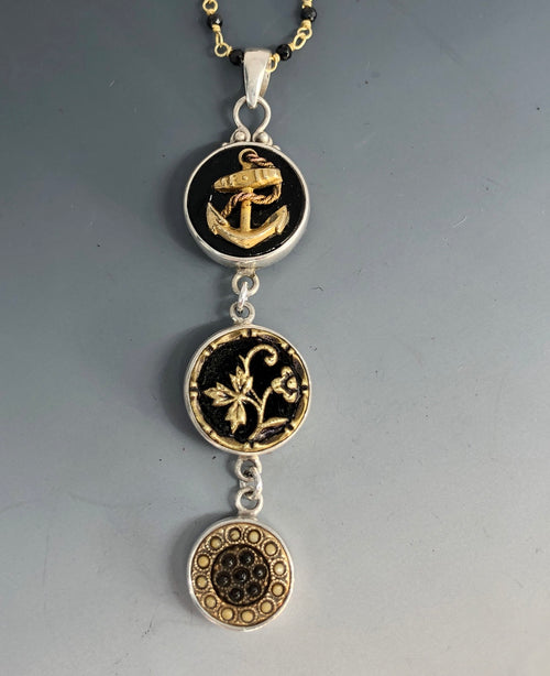 Victorian Three Button Drop Victorian Buttons from the late 1800s set in Sterling Silver Pendant with Spinnel Facet Accent.