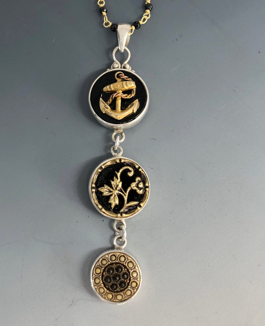 Victorian Three Button Drop Victorian Buttons from the late 1800s set in Sterling Silver Pendant with Spinnel Facet Accent.