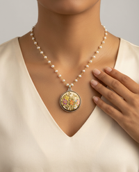 Hand Painted Floral Satsuma Button W/ 24KGold Painted Accent set in Sterling silver Pearl Facet Necklace — worn on model
