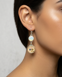 Victorian Double Czech Glass & Glass in Metal Button earring set in Sterling Silver — worn on model