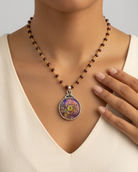 Victorian Carved Pearl Button with Tourmaline facet center w/ Steel Facet Design Pendant 7/8" diameter set in Sterling Silver w/ Garnet Rosary — worn on model