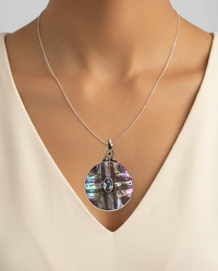 Victorian Carved Shell With Iolite Center set in Sterling silver — worn on model