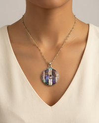 Victorian Carved Shell w/ facet Amethyst Center Button set in Sterling silver — worn on model