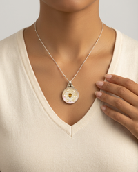 Victorian Carved Shell Button W/ Tourmaline set in Sterling silver — worn on model