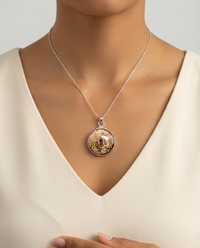 Victorian Carved Pearl Button Village Scene w/ Tourmaline Center set in Sterling Silver — worn on model