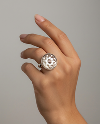 Victorian Carved Pearl Shell Button with Tourmaline Center set in Sterling Silver Ring Setting Size 7.5 — worn on model