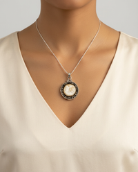 Victorian Village Scene Conch Shell W/ Steel Facet Rim set in Sterling Silver W/ Sterling Satellite Chain — worn on model