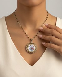 Victorian Floral White Enamel W/ Open Work Metal & Steel Accent Border Button set in sterling silver Pendant w/ Pyrite Stone Rosary Accent — worn on model