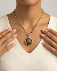 Victorian Metal Hot Air Balloon Button set in Sterling silver pendant w/ stone Rosary accent — worn on model