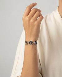 Victorian Tinted Carved Shell With Steel Accent Buttons set in Sterling Silver Bracelet 8" — worn on model