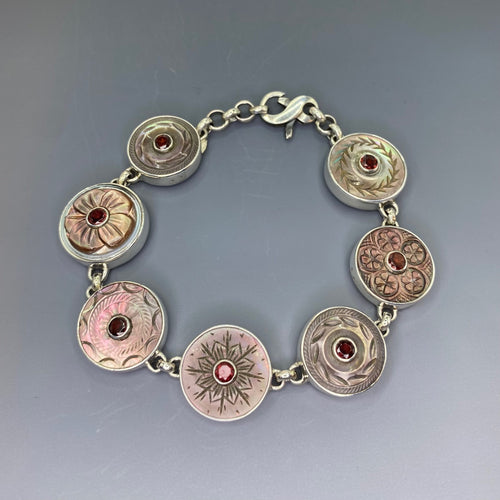 Victorian Carved Shell Buttons Bracelet with Garnet Facet Stone Center set in Sterling Silver