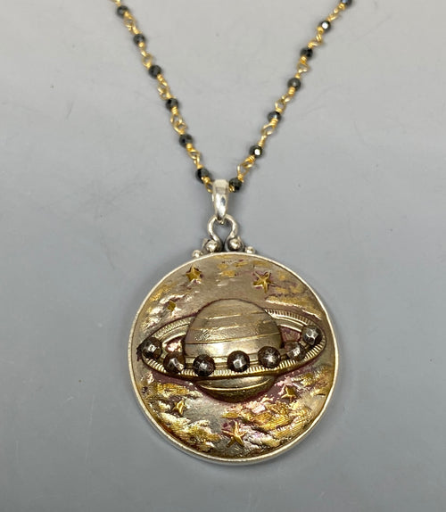 Victorian Metal Saturn Image w/ Steel Facet Ring set in Sterling silver W/ Pyrrite Facet Rosary Accent
