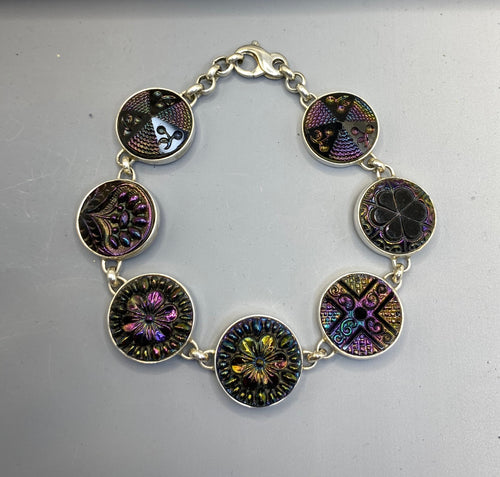 Early 1900s Czech Republic Carnival Luster Glass Buttons set in Sterling Silver Bracelet