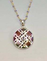 Ornate Victorian Carved Pearl w/ Steel Facet set in Sterling Silver with Tanzanite Rosary accent.