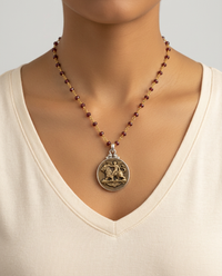 Victorian Picture Metal Button Cherub & Lion Love Conquers Fear Button set in Sterling silver Pendant w/ Garnet Facet Rosary 18" Necklace — worn on model