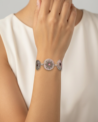 Victorian Carved Shell Buttons Bracelet with Garnet Facet Stone Center set in Sterling Silver — worn on model