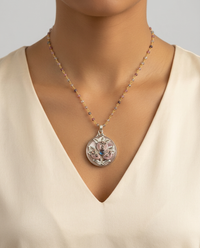 Victorian Carved Shell Pearl Button w/ Saphiret 24K & Glass Center w/ Steel Facet  set in Sterling silver w/ Sterling Silver Necklace — worn on model