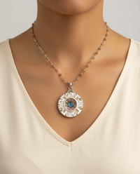 Victorian Carved Shell Pearl Button w/ Saphiret 24K & Glass Center set in Sterling silver w/ Garnets Necklace — worn on model