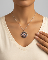 Victorian Carved Shell Pearl Button w/ Saphiret 24K & Glass Center w/ Steel Facet Border set in Sterling silver w/ Sterling Silver Necklace — worn on model