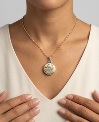 Hand Painted Floral Satsuma Button W/ Gold Painted Accent set in Sterling silver Pearl Facet Necklace — worn on model