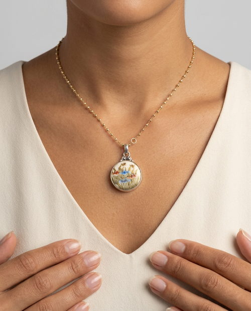 Hand Painted Floral Satsuma Button W/ Gold Painted Accent set in Sterling silver Pearl Facet Necklace — worn on model