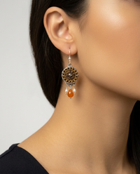 Victorian Metal With Steel Facet Rim Button Set in Sterling Silver with Carnelian and Pearl Accent — worn on model