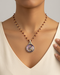 Victorian Carved Tinted Pearl Button with Topaz facet center w/ Steel Facet Design Pendant 7/8" diameter set in Sterling Silver w/ Garnet Rosary — worn on model