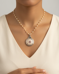 Victorian Carved Pearl Button with Tourmaline facet center Pendant 7/8" diameter set in Sterling Silver w/ Pearl Rosary — worn on model