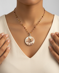 Victorian Carved Shell Tinted Bird Button w/ Tourmaline Facet Stone Center set in Sterling Silver w/ Garnet Necklace — worn on model