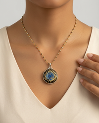 Victorian Design Under Glass Set in Brass Button set in Sterling silver — worn on model