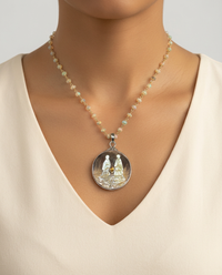 Victorian Carved Pearl Shell Button with Two Figurines & Tourmaline Center set in Sterling silver w/ Sterling Silver Necklace — worn on model