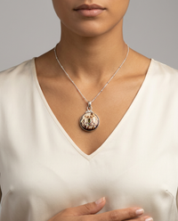 Victorian Carved Shell Button with Tourmaline Stone set in Sterling Silver accent with Sterling silver Chain — worn on model