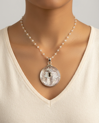 Victorian Carved Pearl Button set in Sterling Silver — worn on model