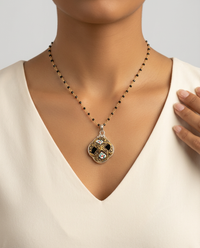 Victorian Hand Painted Enamel set in Sterling Silver w/ Pyrrite Facet Rosary Accent — worn on model