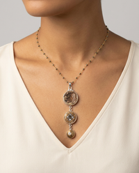 Victorian Three Button Drop Necklace  set in Sterling Silver Pendant w/pyrite Stone necklace — worn on model