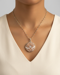 Victorian Glass with Sienna Floral set in Sterling Silver Setting w/ labradorite Stone necklace — worn on model