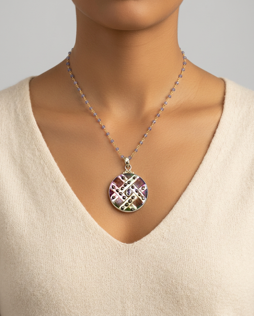 Ornate Victorian Carved Pearl w/ Steel Facet set in Sterling Silver with Tanzanite Rosary accent. — worn on model