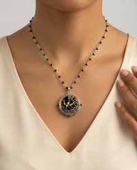 Victorian Velvet Perfume Button Bird Design set in Sterling Silver Accented With Black Spinel & Gold 24" Necklace — worn on model